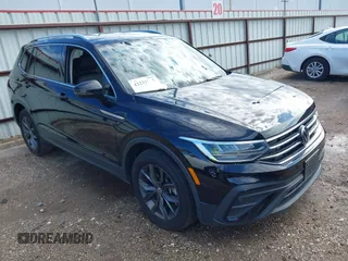 2023 Volkswagen Tiguan SE with VIN 3VV3B7AX6PM120292, listed as a IAAI auction lot 42231082 with 24,045 mi miles and . Bid and sale history available at DreamBid. Image 1.