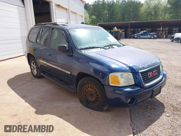 2002 GMC Envoy SLT with VIN 1GKDT13S322515582, listed as a IAAI auction lot 41528624 with 258,904 mi miles. Bid and sale history available at carsss.com. Image 1.