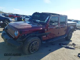 2021 Jeep Gladiator Overland z VIN 1C6HJTFGXML595781, wystawiony jako IAAI lot #41667696 z przebiegiem 31 438 mil mil oraz . Historia ofert i sprzedaży dostępna na DreamBid. Obrazek 2.