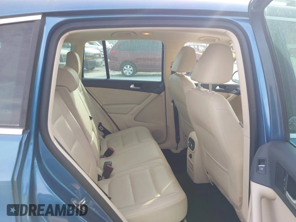 2017 Volkswagen Tiguan Wolfsburg Edition with VIN WVGRV7AX6HW504313, listed as a IAAI auction lot 40950812 with 149,884 mi miles and . Bid and sale history available at DreamBid. Image 8.