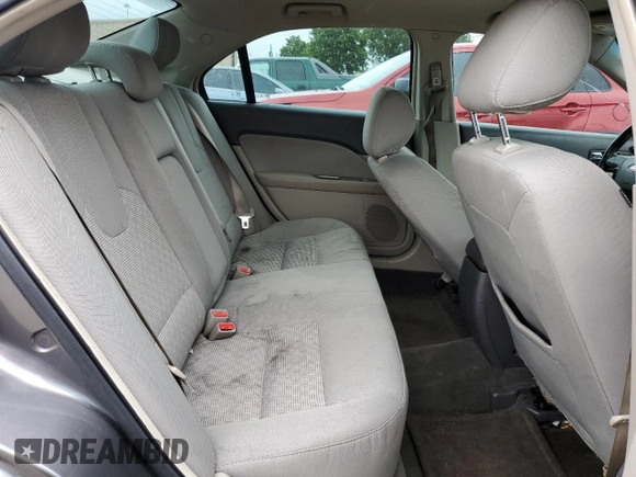 2012 Ford Fusion SEL z VIN 3FAHP0JA2CR232860, wystawiony jako Copart lot #57754735 z przebiegiem 234 638 mil mil oraz Szkody całkowita. Historia ofert i sprzedaży dostępna na DreamBid. Obrazek 10.
