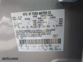 2007 Ford Edge SEL with VIN 2FMDK38C67BA51602, listed as a IAAI auction lot 41810176 with 220,281 mi miles. Bid and sale history available at carsss.com. Image 9.
