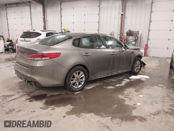 2017 Kia Optima LX with VIN 5XXGT4L33HG148897, listed as a IAAI auction lot 41565592 with 61,471 mi miles and . Bid and sale history available at carsss.com. Image 4.