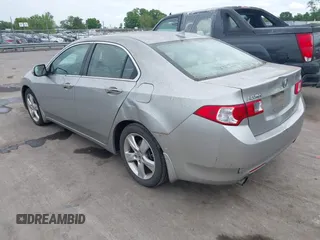 2010 Acura TSX with VIN JH4CU2F60AC019462, listed as a IAAI auction lot 42109261 with 112,131 mi miles. Bid and sale history available at carsss.com. Image 3.