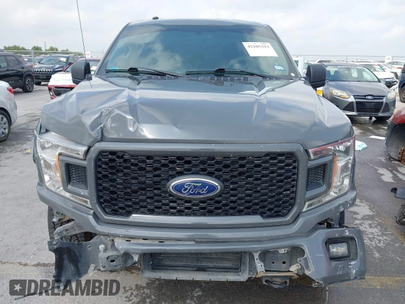 2018 Ford F-150 XL with VIN 1FTEW1EP4JFE22867, listed as a IAAI auction lot 42105313 with 185,175 mi miles and . Bid and sale history available at DreamBid. Image 13.