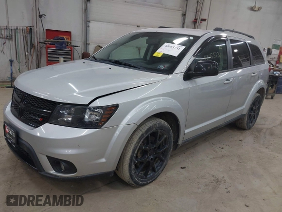 2013 Dodge Journey SXT with VIN 3C4PDCBBXDT661479, listed as a IAAI auction lot 42055731 with 151,963 mi miles. Bid and sale history available at carsss.com. Image 2.