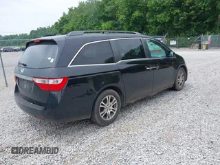 2012 Honda Odyssey EX-L with VIN 5FNRL5H66CB095996, listed as a IAAI auction lot 42446499 with 198,016 mi miles and . Bid and sale history available at DreamBid. Image 4.