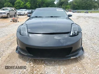 2003 Nissan 350Z Touring z VIN JN1AZ34E53T005833, wystawiony jako Copart lot #55437345 z przebiegiem 144 141 mil mil oraz Szkoda całkowita • Salvage title. Historia ofert i sprzedaży dostępna na DreamBid. Obrazek 5.