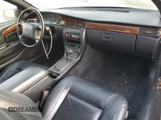 1999 Cadillac Eldorado ESC with VIN 1G6EL12Y8XU614645, listed as a Copart auction lot 86353754 with 151,243 mi miles and Clean Title. Bid and sale history available at DreamBid. Image 8.