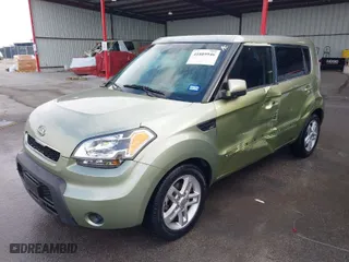 2011 Kia Soul + with VIN KNDJT2A26B7296787, listed as a IAAI auction lot 41889946 with 129,052 mi miles. Bid and sale history available at carsss.com. Image 2.