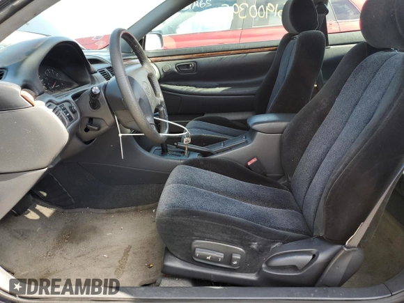 1999 Toyota Solara SE with VIN 2T1CF22P6XC135534, listed as a Copart auction lot 61900395 with 177,838 mi miles and Salvage title. Bid and sale history available at DreamBid. Image 7.