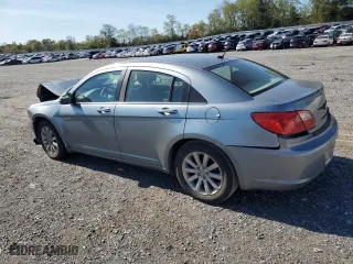 2010 Chrysler Sebring Limited with VIN 1C3CC5FB8AN212308, listed as a Copart auction lot 75617154 with 136,629 mi miles and Salvage Title. Bid and sale history available at carsss.com. Image 2.