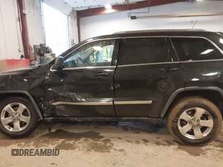 2012 Jeep Grand Cherokee Laredo with VIN 1C4RJFAT1CC225479, listed as a IAAI auction lot 41709911 with 227,150 mi miles. Bid and sale history available at carsss.com. Image 14.