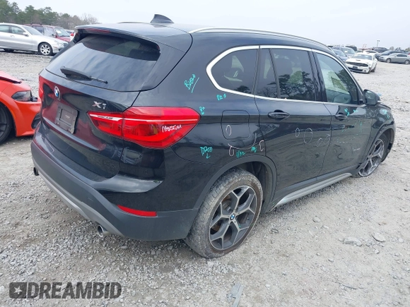 2017 BMW X1 sDrive28i with VIN WBXHU7C36HP924874, listed as a IAAI auction lot 41368396 with 113,443 mi miles. Bid and sale history available at carsss.com. Image 4.