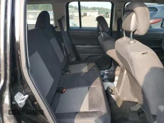2013 Jeep Patriot Sport z VIN 1C4NJPBA0DD245848, wystawiony jako Copart lot #60368145 z przebiegiem 97 920 mil mil oraz Czysty tytuł • Clean title. Historia ofert i sprzedaży dostępna na DreamBid. Obrazek 11.