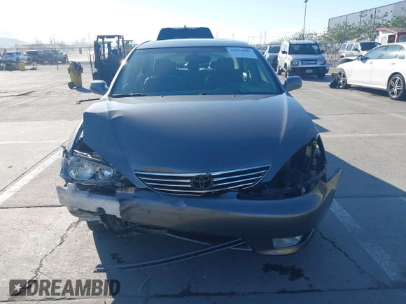 2005 Toyota Camry LE with VIN 4T1BF30K55U619313, listed as a IAAI auction lot 41854001 with 89,982 mi miles and . Bid and sale history available at DreamBid. Image 13.