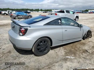 2003 Toyota Celica GT z VIN JTDDR32T730157268, wystawiony jako Copart lot #68884804 z przebiegiem 209 728 mil mil oraz Nie do naprawy • Non repairable. Historia ofert i sprzedaży dostępna na DreamBid. Obrazek 3.