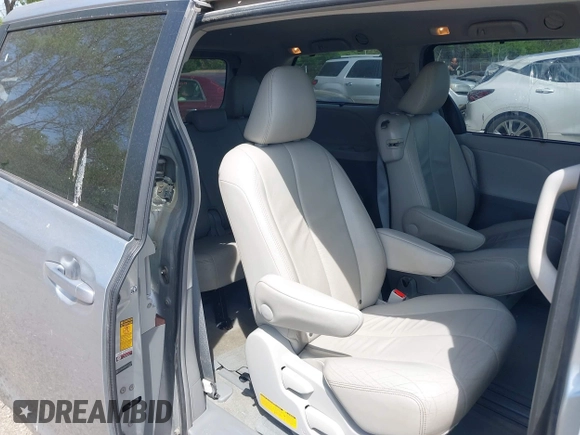 2014 Toyota Sienna XLE with VIN 5TDYK3DC9ES413283, listed as a IAAI auction lot 42091379 with 184,506 mi miles and . Bid and sale history available at DreamBid. Image 8.