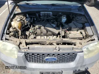 2005 Ford Escape XLT z VIN 1FMYU03155KB11291, wystawiony jako Copart lot #52246495 z przebiegiem Nie podano mil oraz Szkoda całkowita • Salvage title. Historia ofert i sprzedaży dostępna na DreamBid. Obrazek 11.