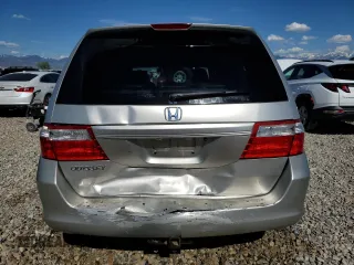 2007 Honda Odyssey EX-L z VIN 5FNRL38647B028078, wystawiony jako Copart lot #56208005 z przebiegiem 192 000 mil mil oraz Szkoda całkowita • Salvage title. Historia ofert i sprzedaży dostępna na DreamBid. Obrazek 6.