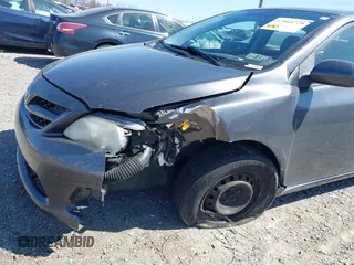 2011 Toyota Corolla L with VIN JTDBU4EE4B9144190, listed as a IAAI auction lot 42060728 with 115,299 mi miles. Bid and sale history available at carsss.com. Image 6.