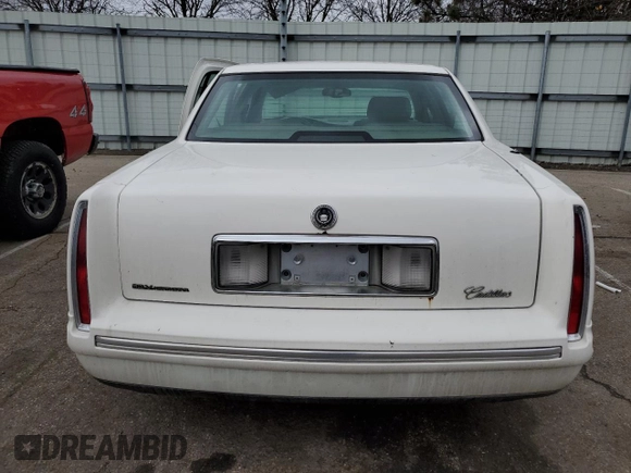 1998 Cadillac DeVille with VIN 1G6KD54Y7WU755628, listed as a Copart auction lot 45166875 with 165,385 mi miles and Salvage Title. Bid and sale history available at carsss.com. Image 6.