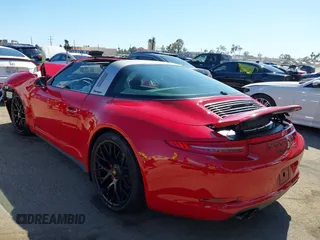 2016 Porsche 911 4S z VIN WP0BB2A99GS136573, wystawiony jako IAAI lot #42238845 z przebiegiem 13 464 mil mil oraz . Historia ofert i sprzedaży dostępna na DreamBid. Obrazek 3.