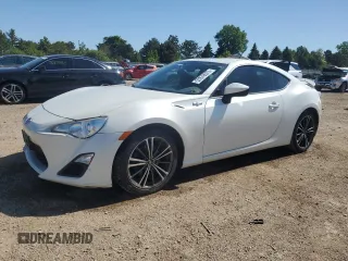 2014 Scion FR-S z VIN JF1ZNAA16E8702862, wystawiony jako Copart lot #57879575 z przebiegiem 101 775 mil mil oraz Szkoda całkowita • Salvage title. Historia ofert i sprzedaży dostępna na DreamBid. Obrazek 1.