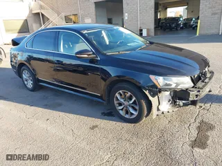 2017 Volkswagen Passat 1.8T S with VIN 1VWAT7A32HC038589, listed as a IAAI auction lot 40958201 with 65,868 mi miles. Bid and sale history available at carsss.com. Image 1.