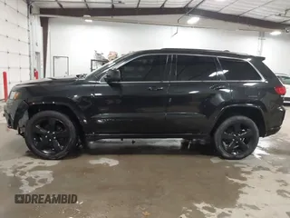 2015 Jeep Grand Cherokee Laredo with VIN 1C4RJFAG3FC115444, listed as a IAAI auction lot 41248211 with 138,828 mi miles. Bid and sale history available at carsss.com. Image 15.