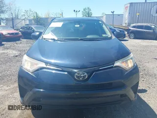 2017 Toyota RAV4 LE with VIN JTMBFREV8HJ168975, listed as a IAAI auction lot 42139354 with 91,394 mi miles and . Bid and sale history available at DreamBid. Image 12.