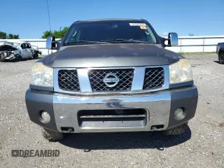 2005 Nissan Titan LE with VIN 1N6BA07B95N571880, listed as a Copart auction lot 57527435 with 199,577 mi miles and Salvage title. Bid and sale history available at DreamBid. Image 5.
