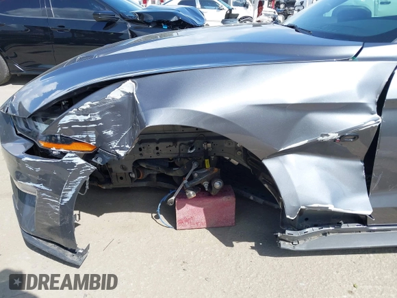 2021 Ford Mustang GT Premium с VIN 1FATP8FF2M5152511, выставлен на аукционе IAAI как лот 41950210 с пробегом 16 246 миль миль и . История ставок и продаж доступна на DreamBid. Изображение 17.