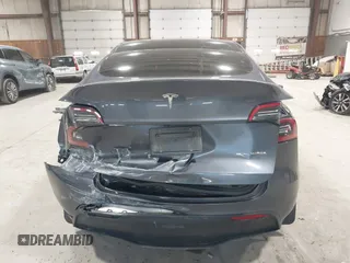 2023 Tesla Model Y Long Range with VIN 7SAYGAEE2PF755674, listed as a IAAI auction lot 41890025 with 24,783 mi miles and . Bid and sale history available at DreamBid. Image 16.