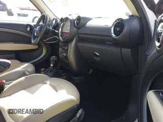 2014 MINI Countryman S with VIN WMWZC3C52EWP26869, listed as a IAAI auction lot 41756310 with 91,941 mi miles and . Bid and sale history available at DreamBid. Image 5.