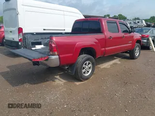 2014 Toyota Tacoma with VIN 3TMMU4FN8EM068048, listed as a IAAI auction lot 42548095 with 126,332 mi miles and . Bid and sale history available at DreamBid. Image 4.