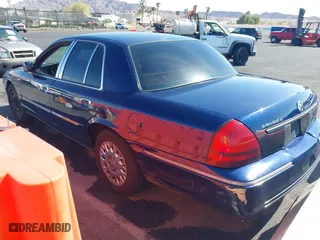 2004 Mercury Grand Marquis GS with VIN 2MEFM74W94X632233, listed as a IAAI auction lot 42051360 with 167,654 mi miles. Bid and sale history available at carsss.com. Image 3.