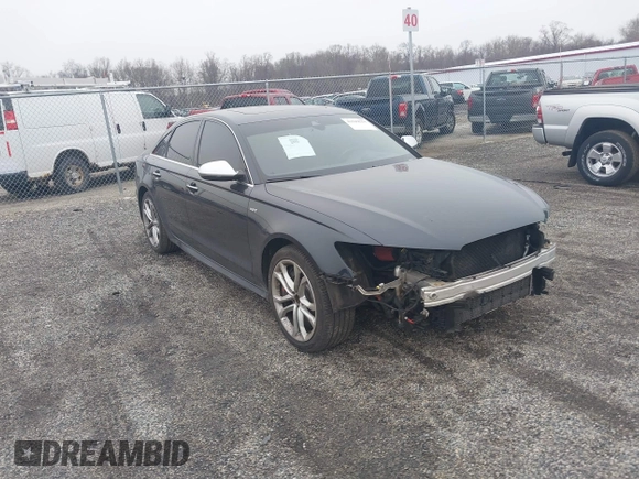 2016 Audi S6 Prestige z VIN WAUH2AFC4GN177293, wystawiony jako IAAI lot #41549559 z przebiegiem 79 715 mil mil oraz . Historia ofert i sprzedaży dostępna na DreamBid. Obrazek 1.