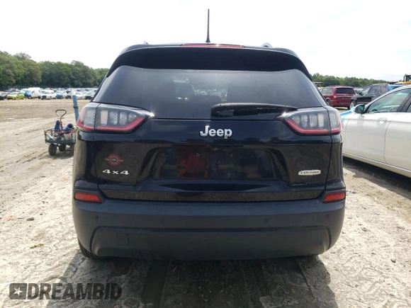 2019 Jeep Cherokee Latitude Plus with VIN 1C4PJMLB7KD101158, listed as a Copart auction lot 58246115 with 144,807 mi miles and Salvage title. Bid and sale history available at DreamBid. Image 6.