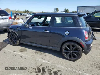 2013 MINI Hardtop S with VIN WMWSV3C5XDT396202, listed as a Copart auction lot 52175055 with 50,701 mi miles and Salvage Title. Bid and sale history available at DreamBid. Image 2.