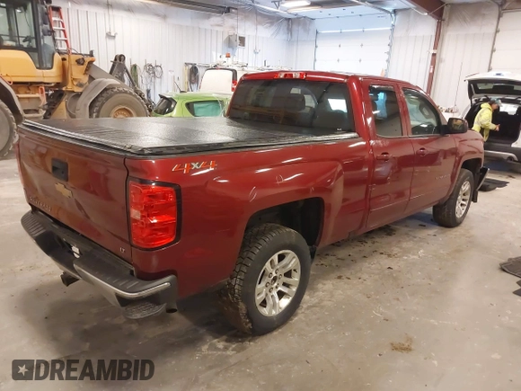 2018 Chevrolet Silverado 1500 LT with VIN 1GCVKREC3JZ190574, listed as a IAAI auction lot 41897346 with 144,927 mi miles and . Bid and sale history available at DreamBid. Image 4.