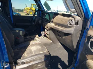 2024 Jeep Gladiator Willys z VIN 1C6HJTAG0RL123040, wystawiony jako IAAI lot #41849222 z przebiegiem 14 989 mil mil oraz . Historia ofert i sprzedaży dostępna na DreamBid. Obrazek 5.
