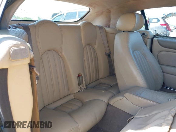 2002 Jaguar XK with VIN SAJDA42C12NA30499, listed as a IAAI auction lot 41954577 with 77,152 mi miles and . Bid and sale history available at DreamBid. Image 8.
