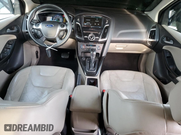 2015 Ford Focus Electric with VIN 1FADP3R43FL221870, listed as a Copart auction lot 79549284 with 67,079 mi miles and Salvage title. Bid and sale history available at DreamBid. Image 8.