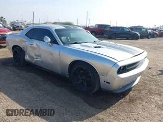 2012 Dodge Challenger SXT Plus with VIN 2C3CDYAG9CH104972, listed as a IAAI auction lot 41738042 with 148,794 mi miles. Bid and sale history available at carsss.com. Image 1.