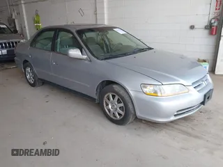 2002 Honda Accord SE z VIN 1HGCG56742A060288, wystawiony jako IAAI lot #42431529 z przebiegiem 154 310 mil mil oraz . Historia ofert i sprzedaży dostępna na DreamBid. Obrazek 1.