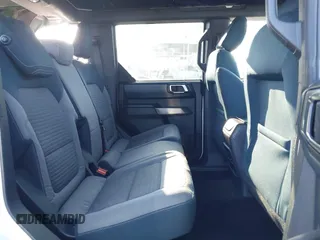 2021 Ford Bronco z VIN 1FMEE5DP7MLA93692, wystawiony jako IAAI lot #42222219 z przebiegiem 18 982 mil mil oraz . Historia ofert i sprzedaży dostępna na DreamBid. Obrazek 8.