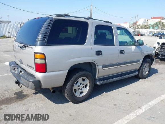 2004 Chevrolet Tahoe LS with VIN 1GNEC13T44R208111, listed as a IAAI auction lot 42189452 with 207,736 mi miles and . Bid and sale history available at DreamBid. Image 4.
