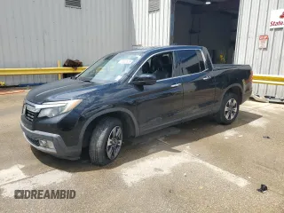 2018 Honda Ridgeline RTL-E with VIN 5FPYK3F78JB017738, listed as a Copart auction lot 62852835 with 95,778 mi miles and Salvage title. Bid and sale history available at DreamBid. Image 1.