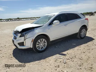 2019 Cadillac XT5 FWD with VIN 1GYKNARS0KZ121284, listed as a Copart auction lot 49339815 with 56,759 mi miles and Salvage Title. Bid and sale history available at carsss.com. Image 1.